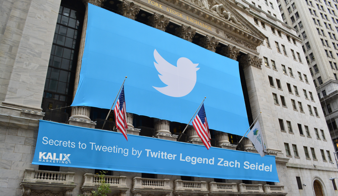 Twitter banner across a building front