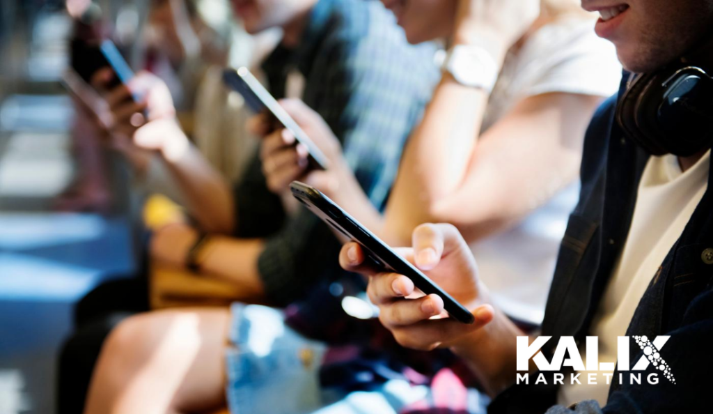 Gen Z students on their mobile devices
