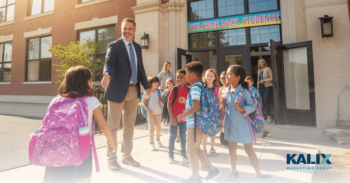 School principle welcoming students at Back-to-School day